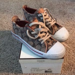Coach logo shoes.